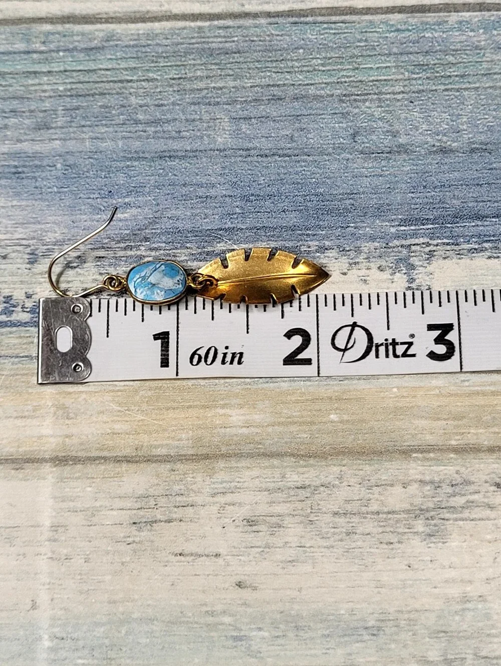 Gold Palm Leaves Drop Earrings with Blue Stone